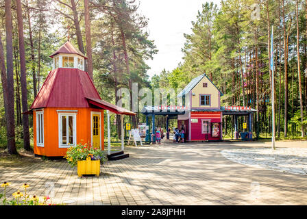 Reiu küla, Pärnumaa/Estonia-23JUL2019: Children`s theme park called Lottemaa (Lotte village) with colorful wooden houses in forest, built by Lotte car Stock Photo